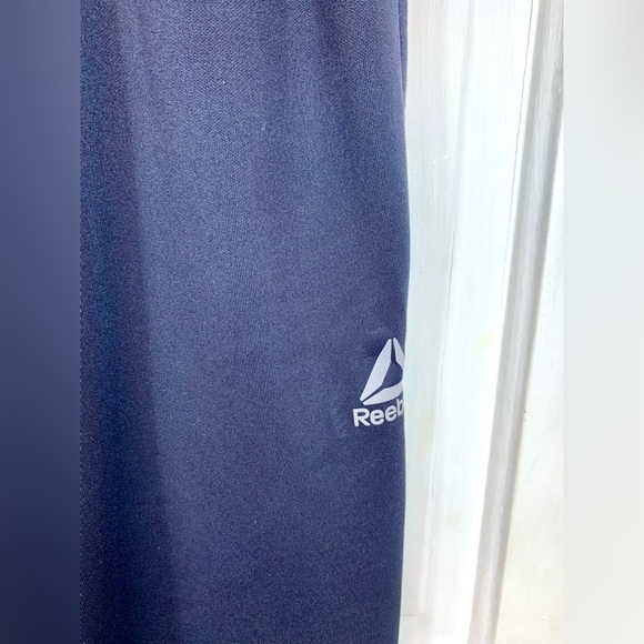 Reebok Dark Gray Stretchy Soft Track Pants. 3 pockets.  Zippers at leg base. - Picture 6 of 13